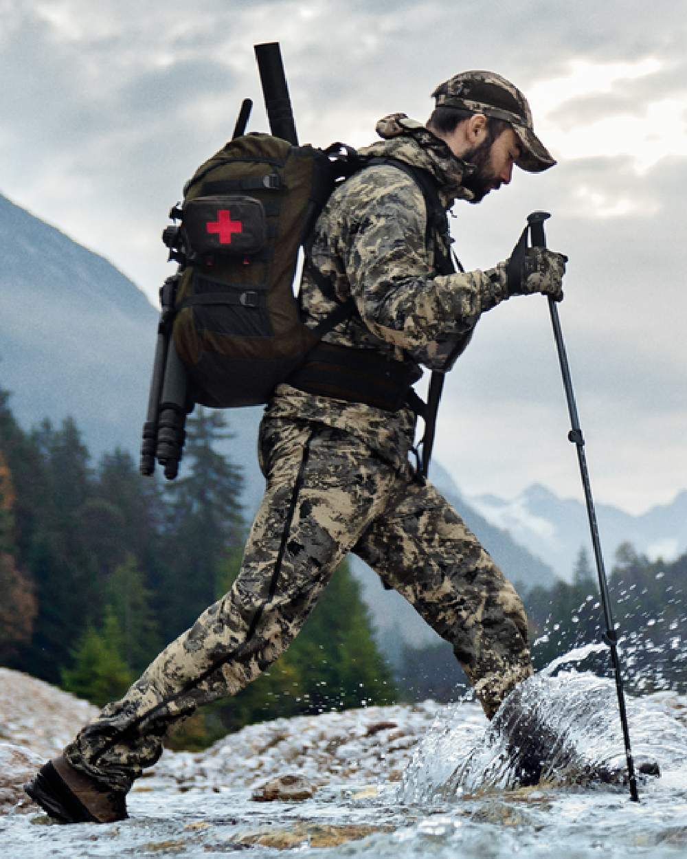 AXIS Mountain Coloured Harkila Mountain Hunter Expedition HWS Packable Jacket on outdoor background