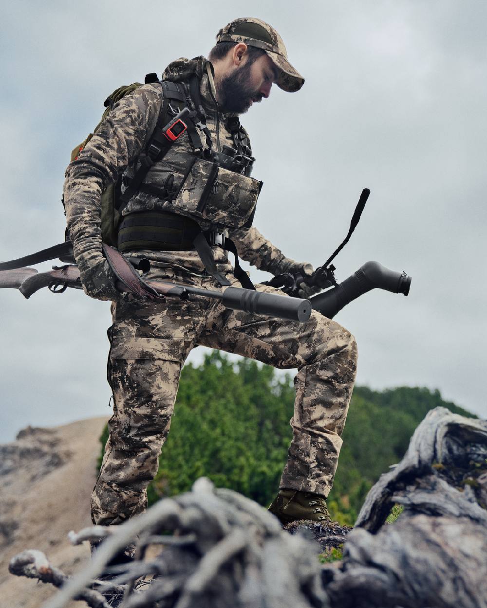 AXIS Mountain Coloured Harkila Mountain Hunter Expedition Light Trousers on outdoor background