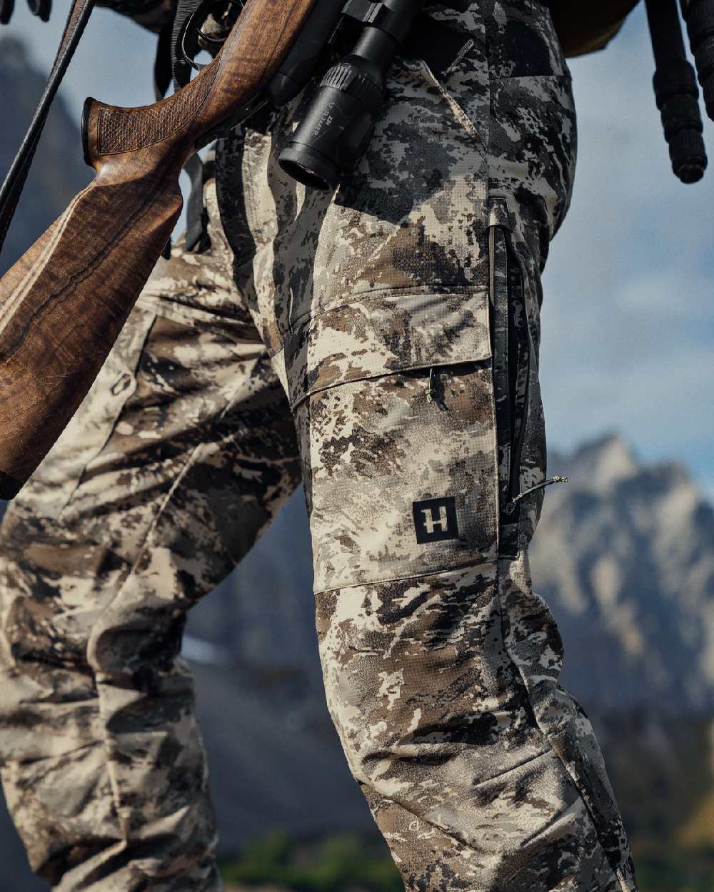 AXIS Mountain Coloured Harkila Mountain Hunter Expedition Light Trousers on outdoor background