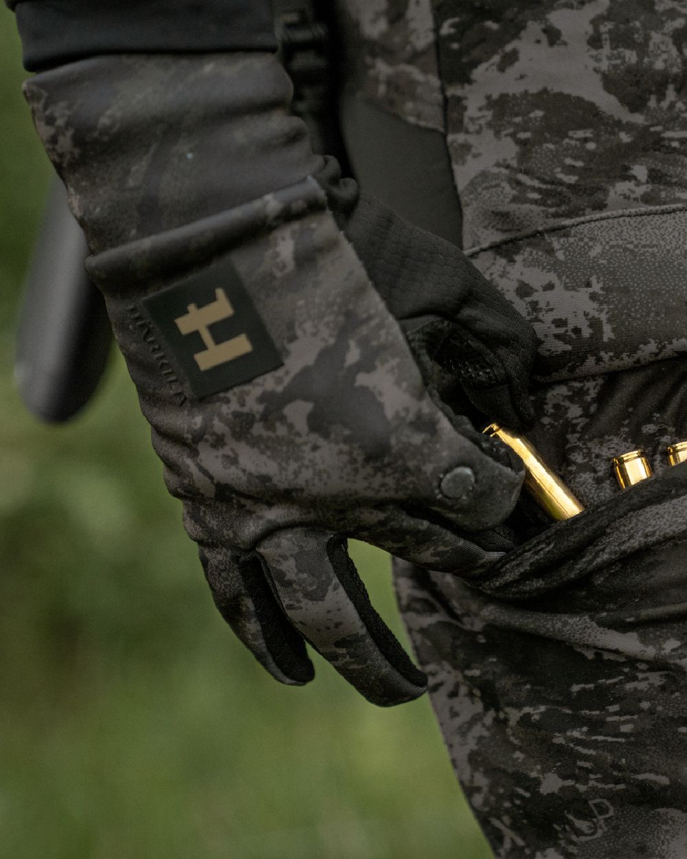 AXIS Black Coloured Harkila NOCTYX Camo Fleece Glove with Foldback Finger on outdoor background