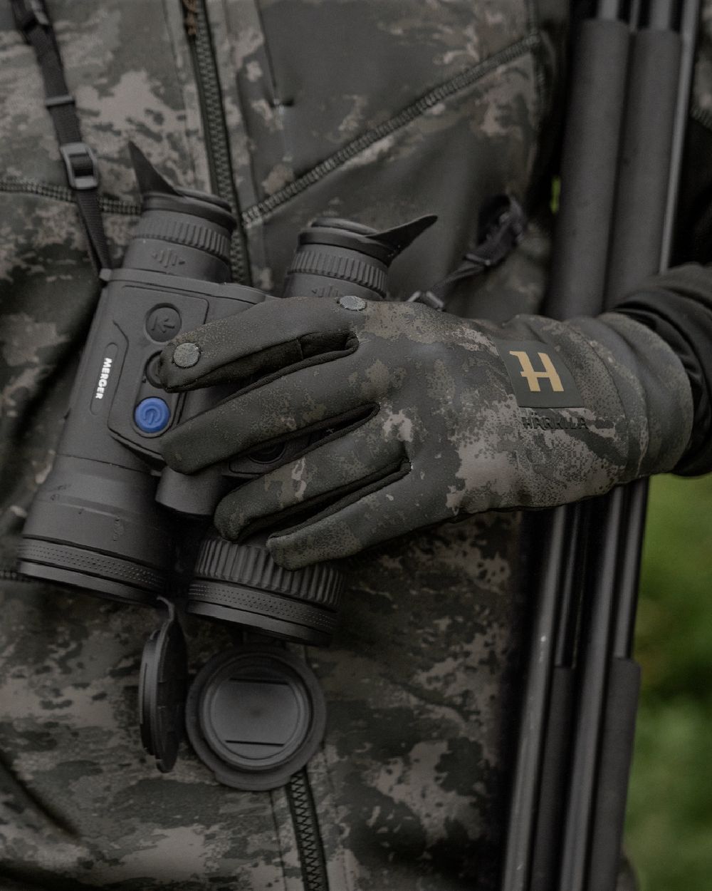 AXIS Black Coloured Harkila NOCTYX Camo Fleece Glove with Foldback Finger on outdoor background