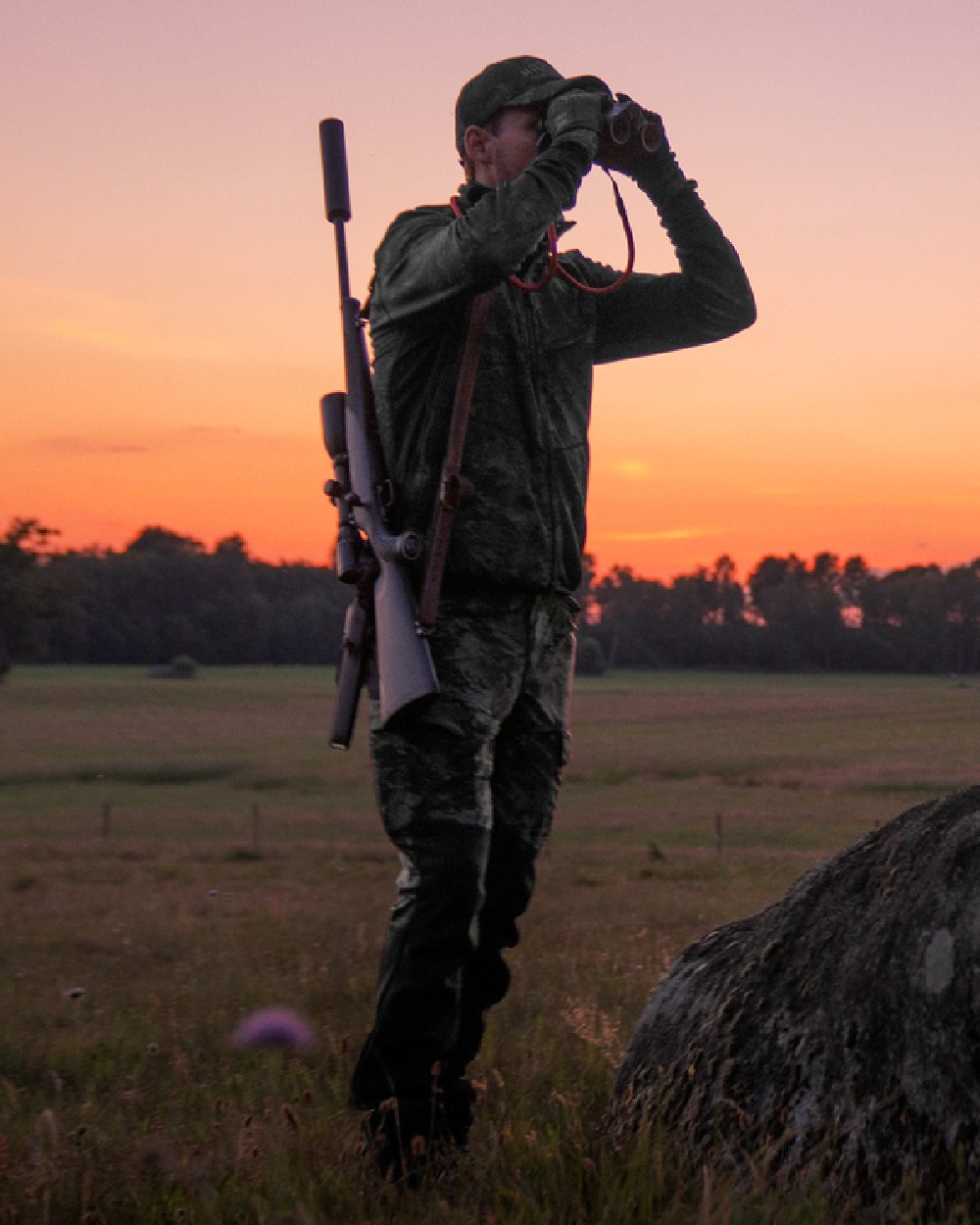 AXIS Black Black Coloured Harkila NOCTYX Camo Fleece Jacket on outdoor background