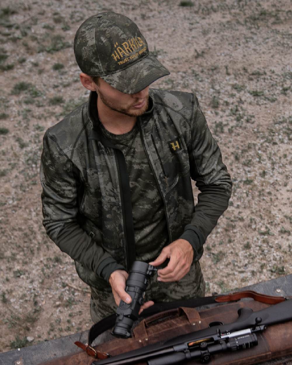 AXIS Black Black Coloured Harkila NOCTYX Camo Fleece Jacket on outdoor background