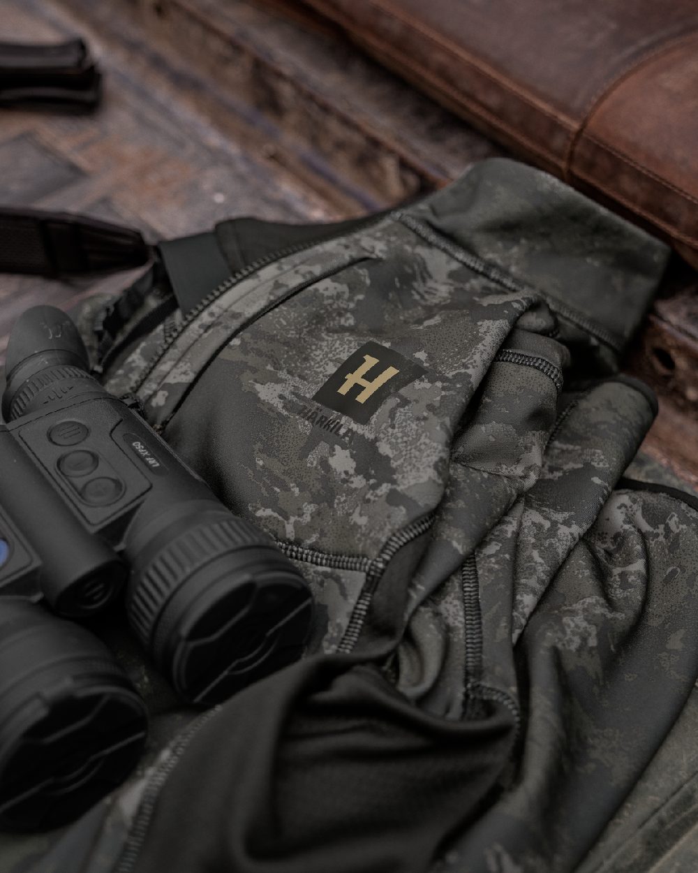 AXIS Black Black Coloured Harkila NOCTYX Camo Fleece Jacket on outdoor background