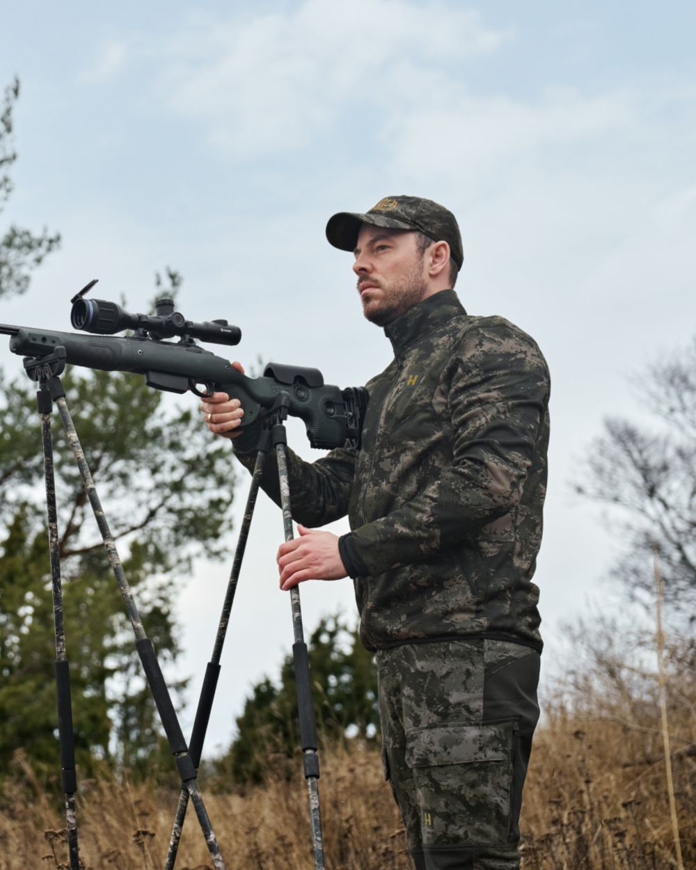 Axis MSP Black Coloured Harkila NOCTYX Camo Full Zip Fleece Jacket on outdoor background