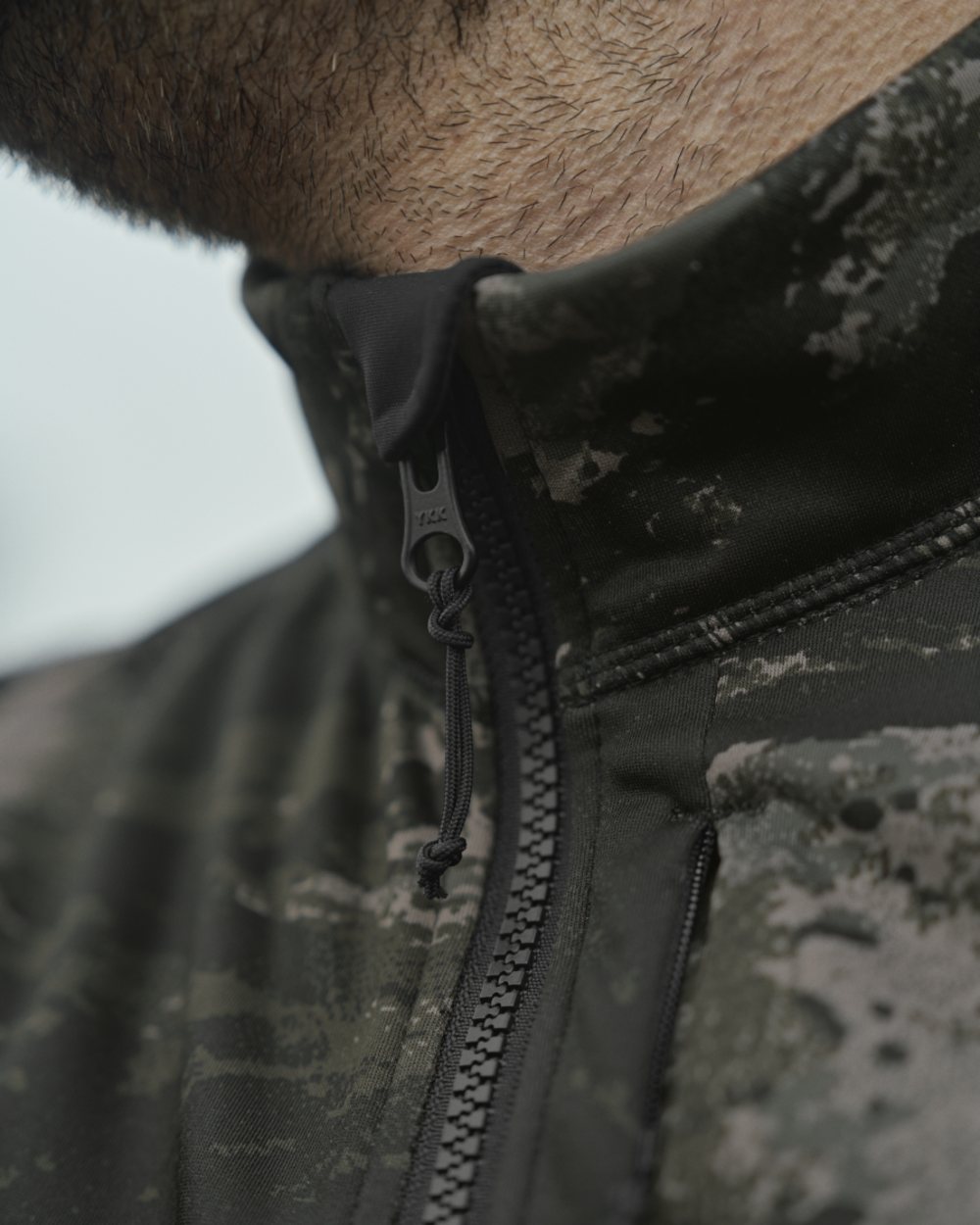 Axis MSP Black Coloured Harkila NOCTYX Camo Full Zip Fleece Jacket on outdoor background