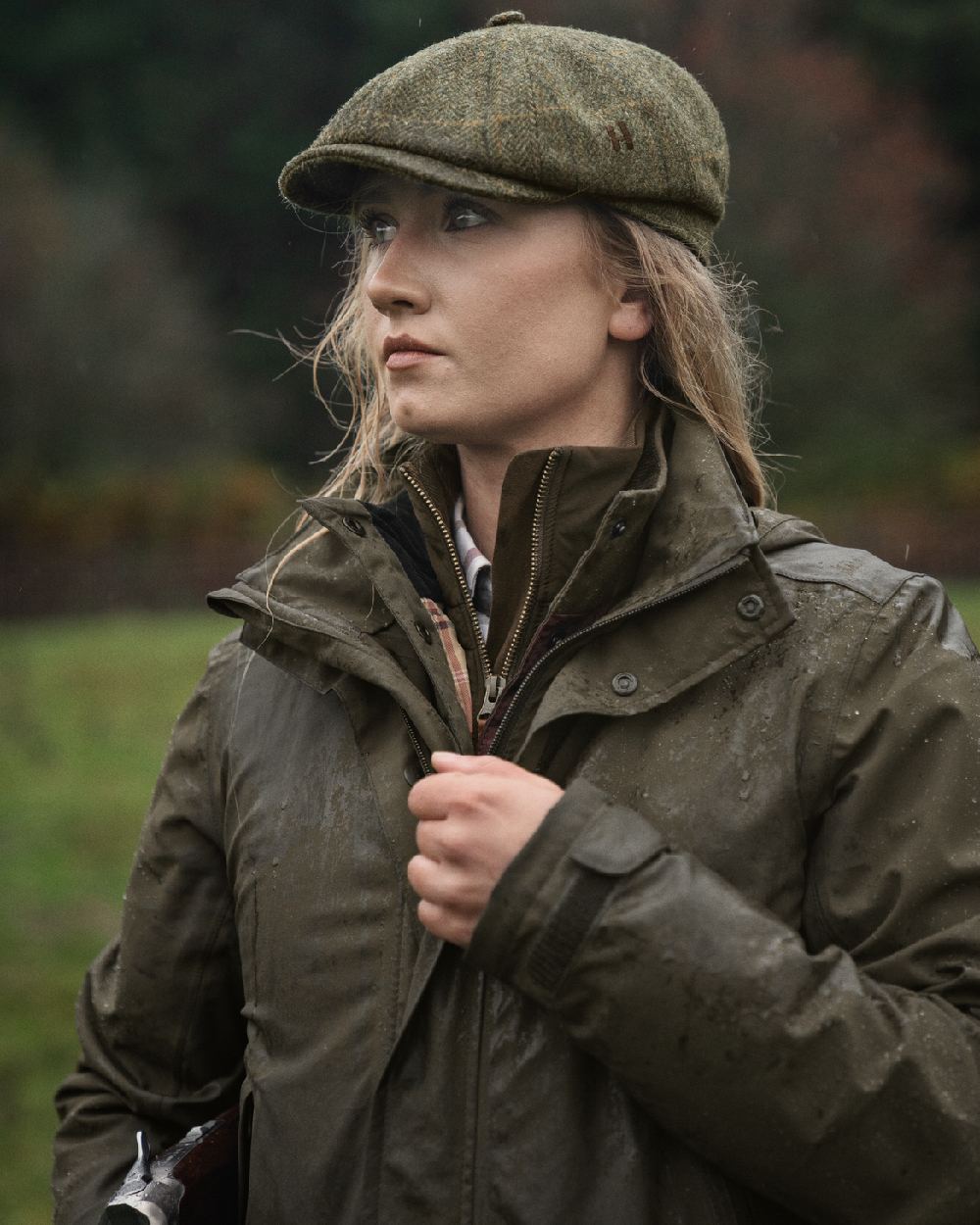 Willow Green Coloured Harkila Orton Packable Lady Jacket on outdoor background