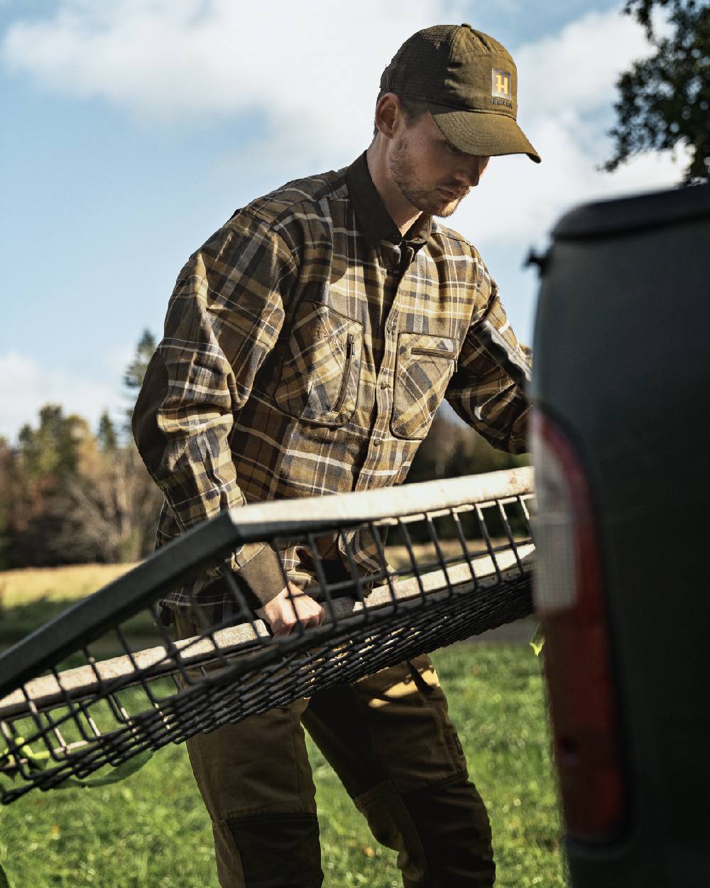 Antique Bronze Coloured Harkila Pajala Check Shirt on outdoor background