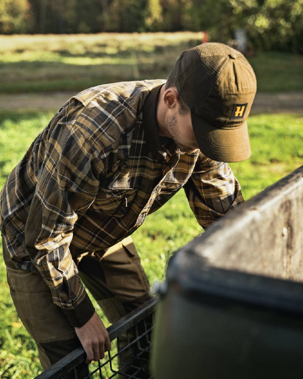 Antique Bronze Coloured Harkila Pajala Check Shirt on outdoor background