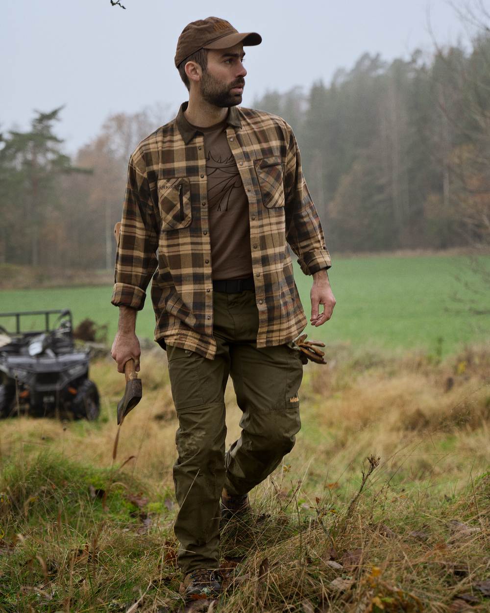 Beige Brown Coloured Harkila Pajala Check Shirt on outdoor background