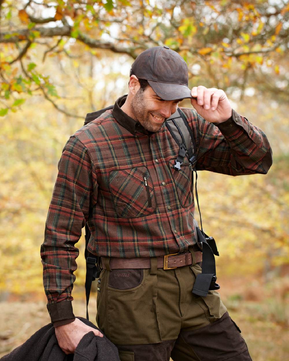 Red Check Coloured Harkila Pajala Check Shirt on outdoor background