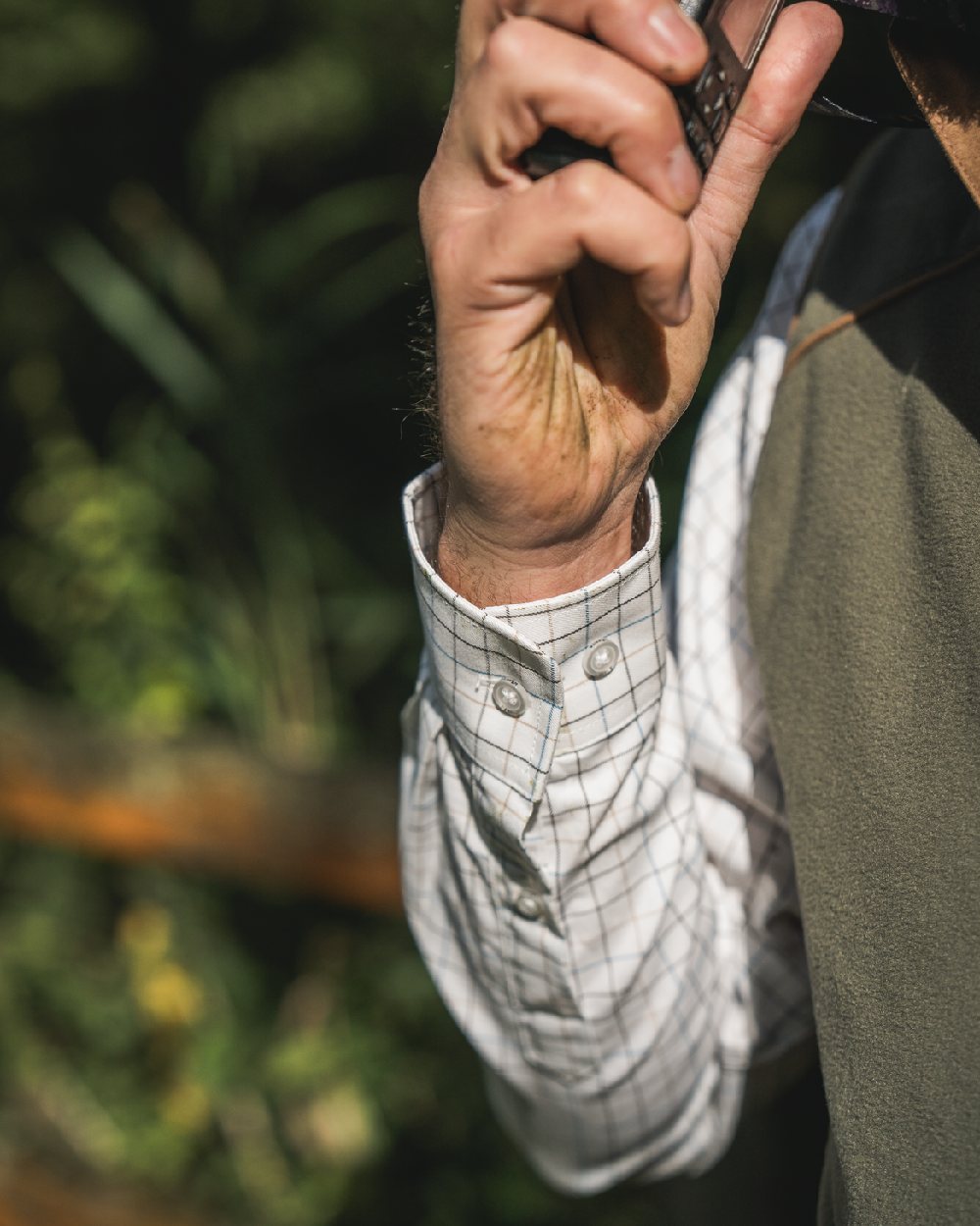 Naval Blue Coloured Harkila Portfield Long Sleeve Shirt on blurry background