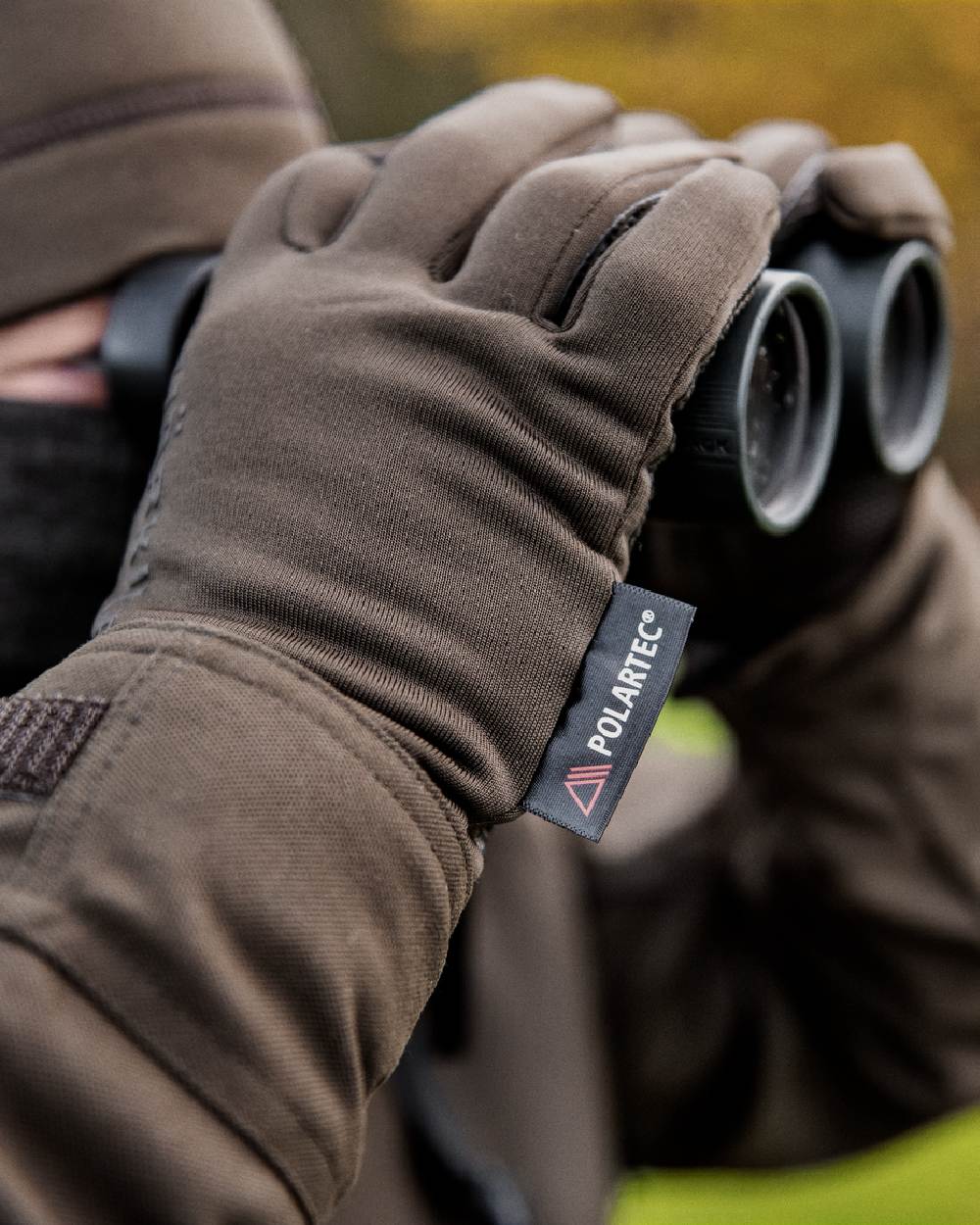 Shadow Brown Coloured Harkila Power Stretch Gloves on outdoor background