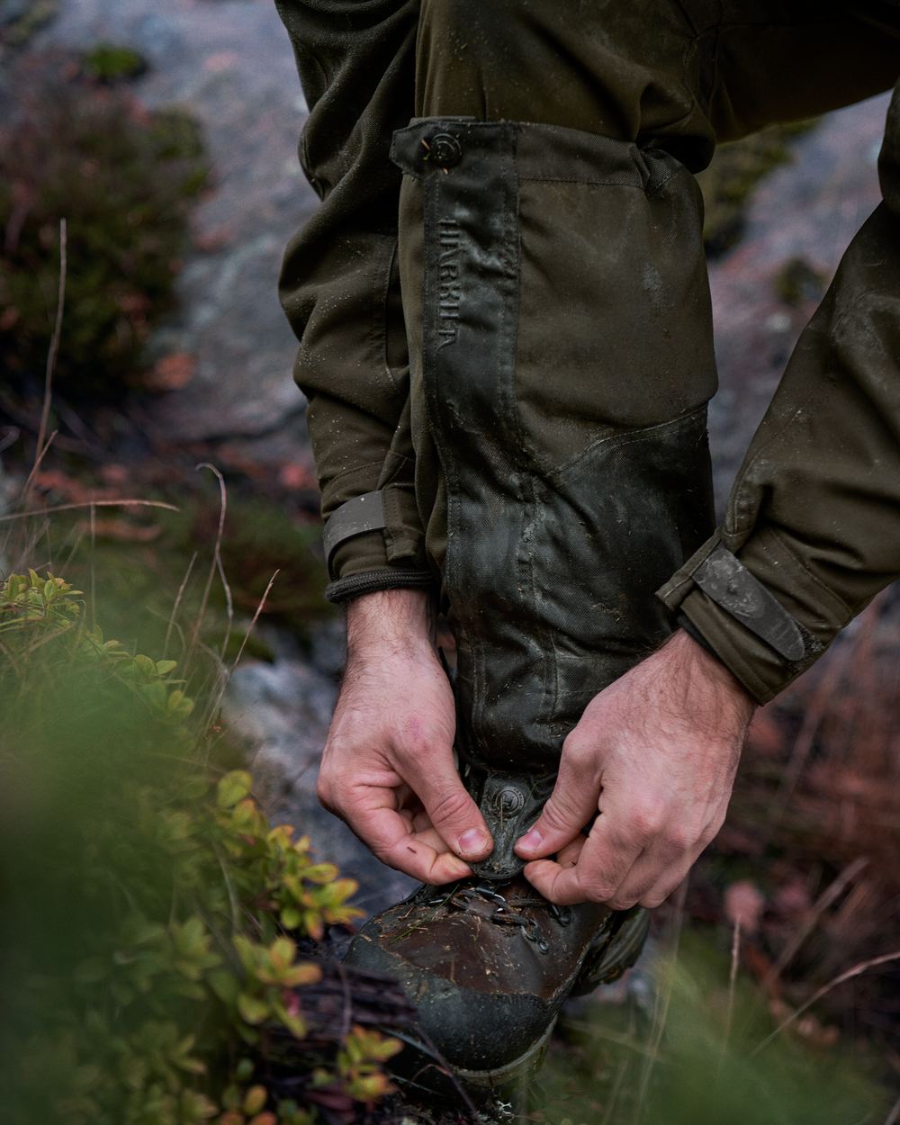 Willow Green Coloured Harkila Pro HWS Gaiters on outdoor background