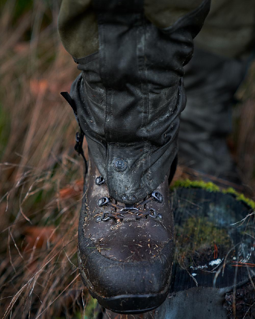 Willow Green Coloured Harkila Pro HWS Gaiters on outdoor background