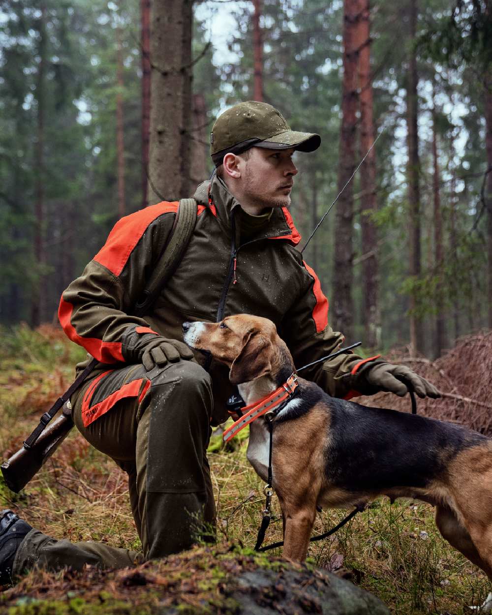Willow Green Orange Coloured Harkila Pro Hunter Dog Keeper GTX Jacket on outdoor background