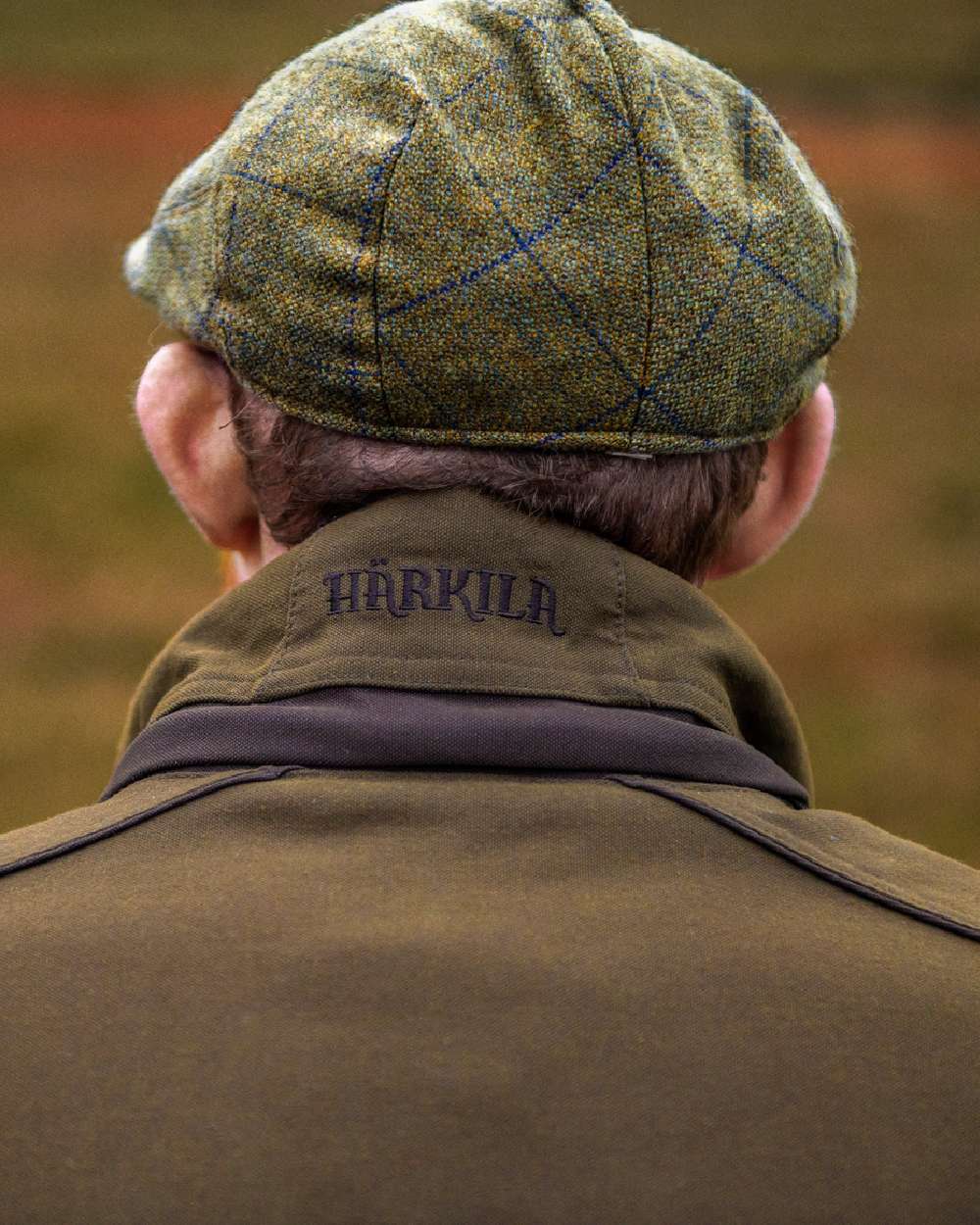 Willow Green Coloured Harkila Pro Hunter Endure Jacket on outdoor background