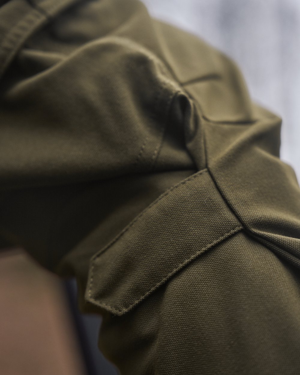 Willow Green Coloured Harkila Pro Hunter GTX Legacy Trousers on outdoor background