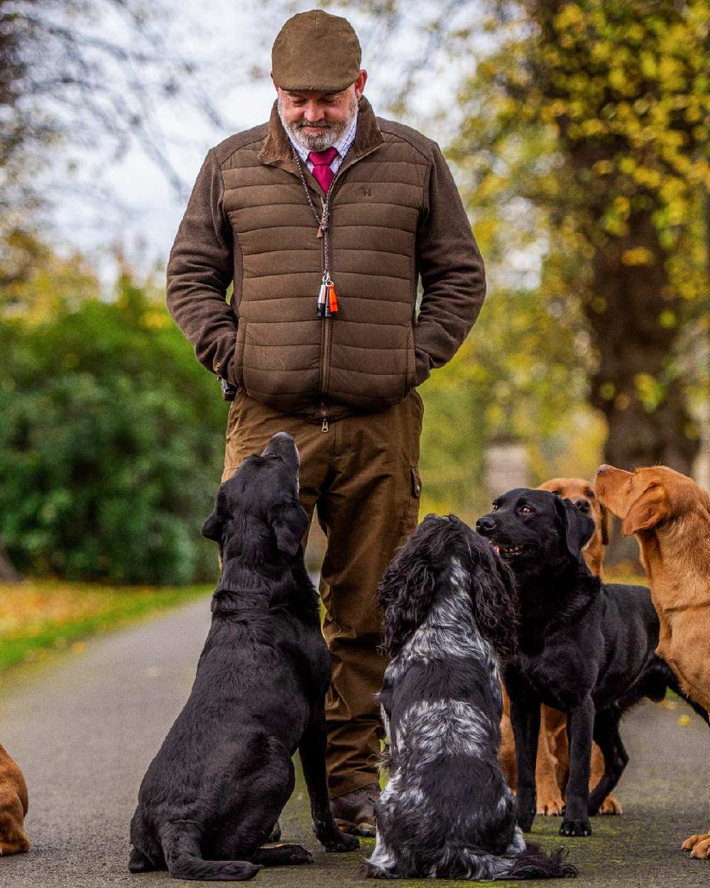 Dark Warm Olive Coloured Harkila Retrieve Insulated Cardigan on outdoor background