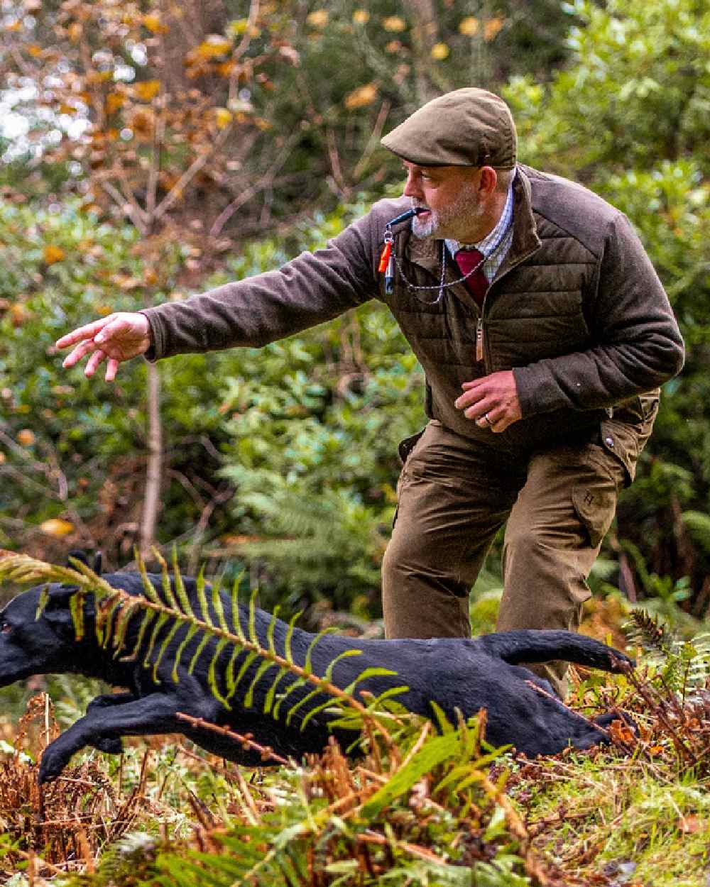 Dark Warm Olive Coloured Harkila Retrieve Insulated Cardigan on outdoor background