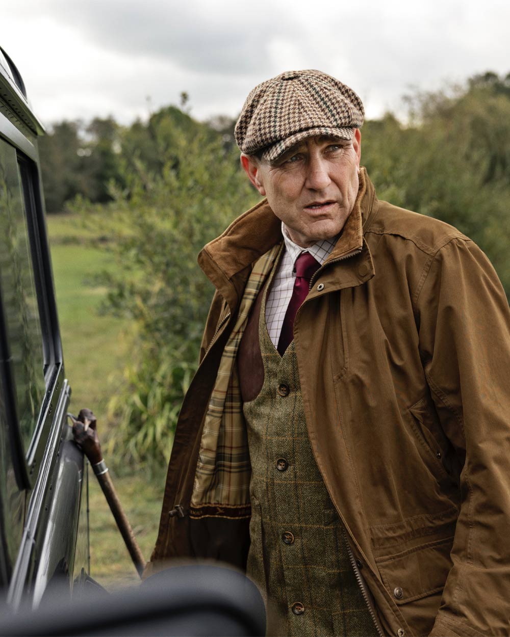 Warm Olive Coloured Harkila Retrieve Jacket on outdoor background