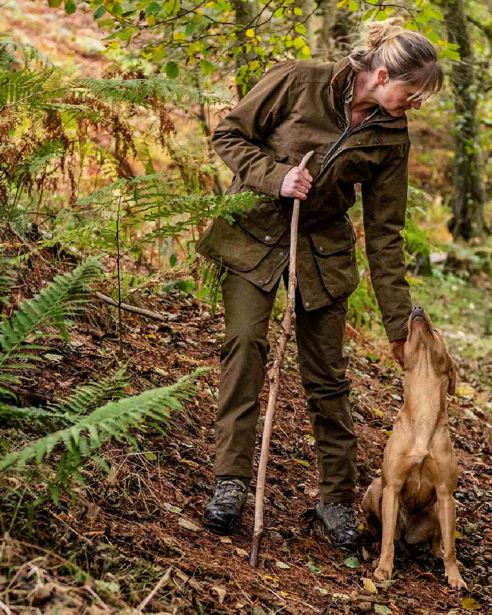 Warm Olive Coloured Harkila Retrieve Lady Jacket on outdoor background