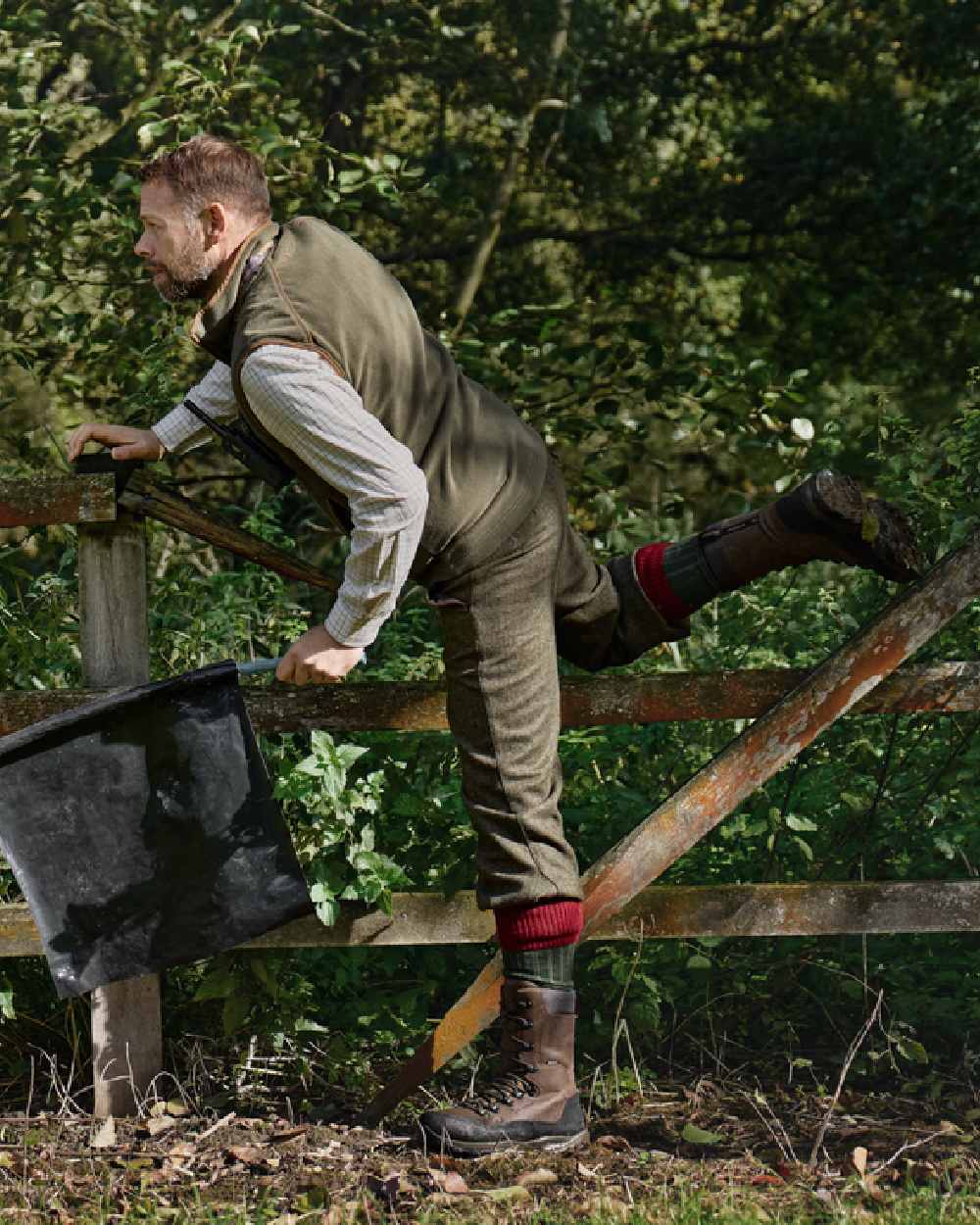 Grape Leaf Coloured Harkila Sandhem 200 Fleece Waistcoat on outdoor background