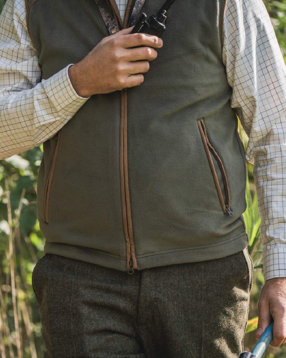 Grape Leaf Coloured Harkila Sandhem 200 Fleece Waistcoat on outdoor background