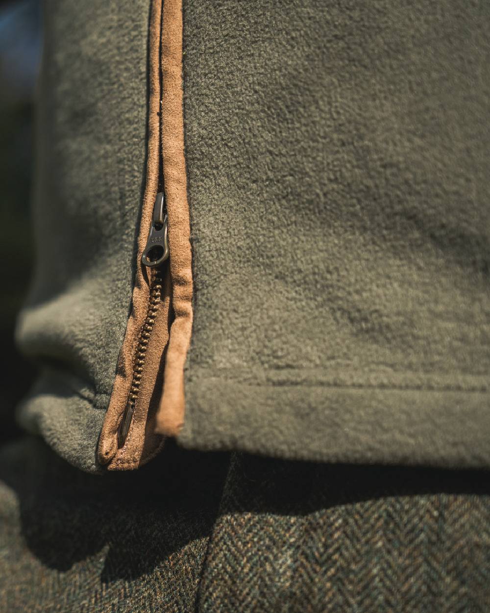 Grape Leaf Coloured Harkila Sandhem 200 Fleece Waistcoat on outdoor background