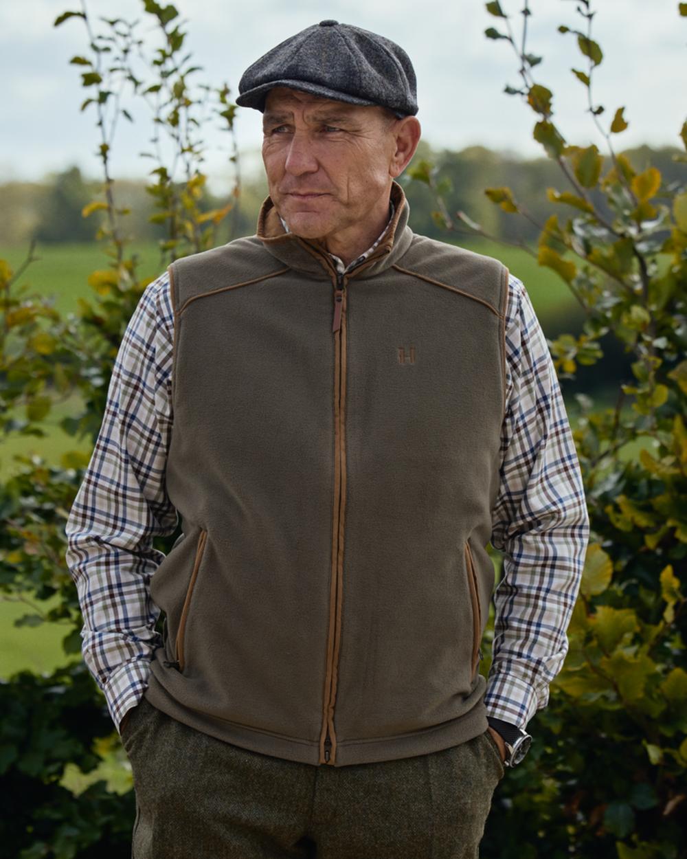 Grape Leaf Coloured Harkila Sandhem 200 Fleece Waistcoat on forest background