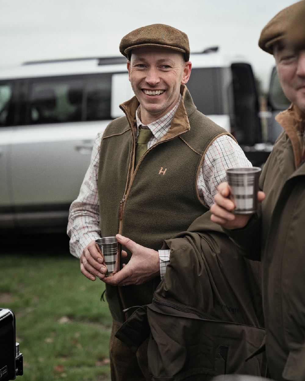 Willow Green Coloured Harkila Sandhem 200 Fleece Waistcoat on outdoor background