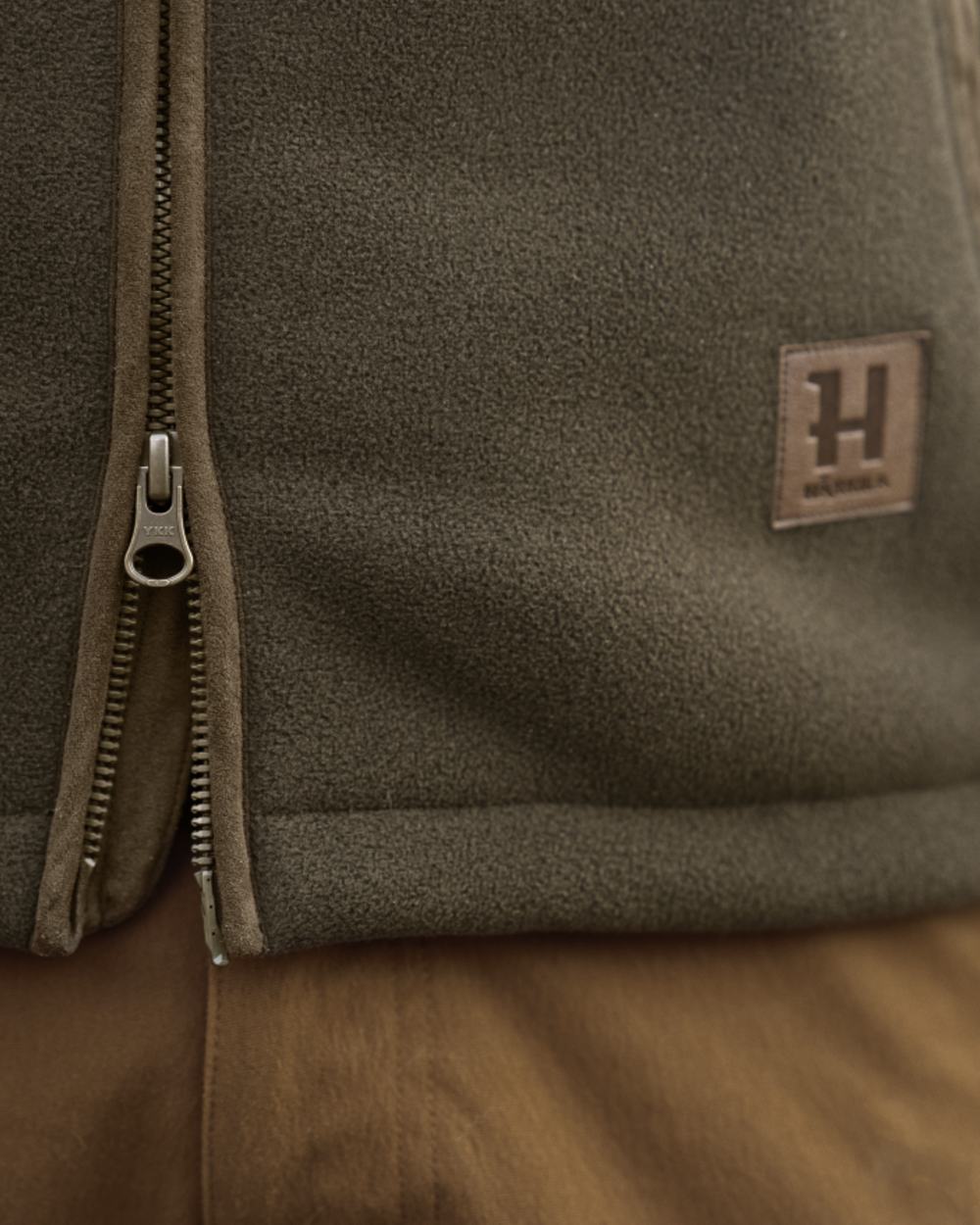 Willow Green Coloured Harkila Sandhem Sherpa Fleece Jacket on outdoor background