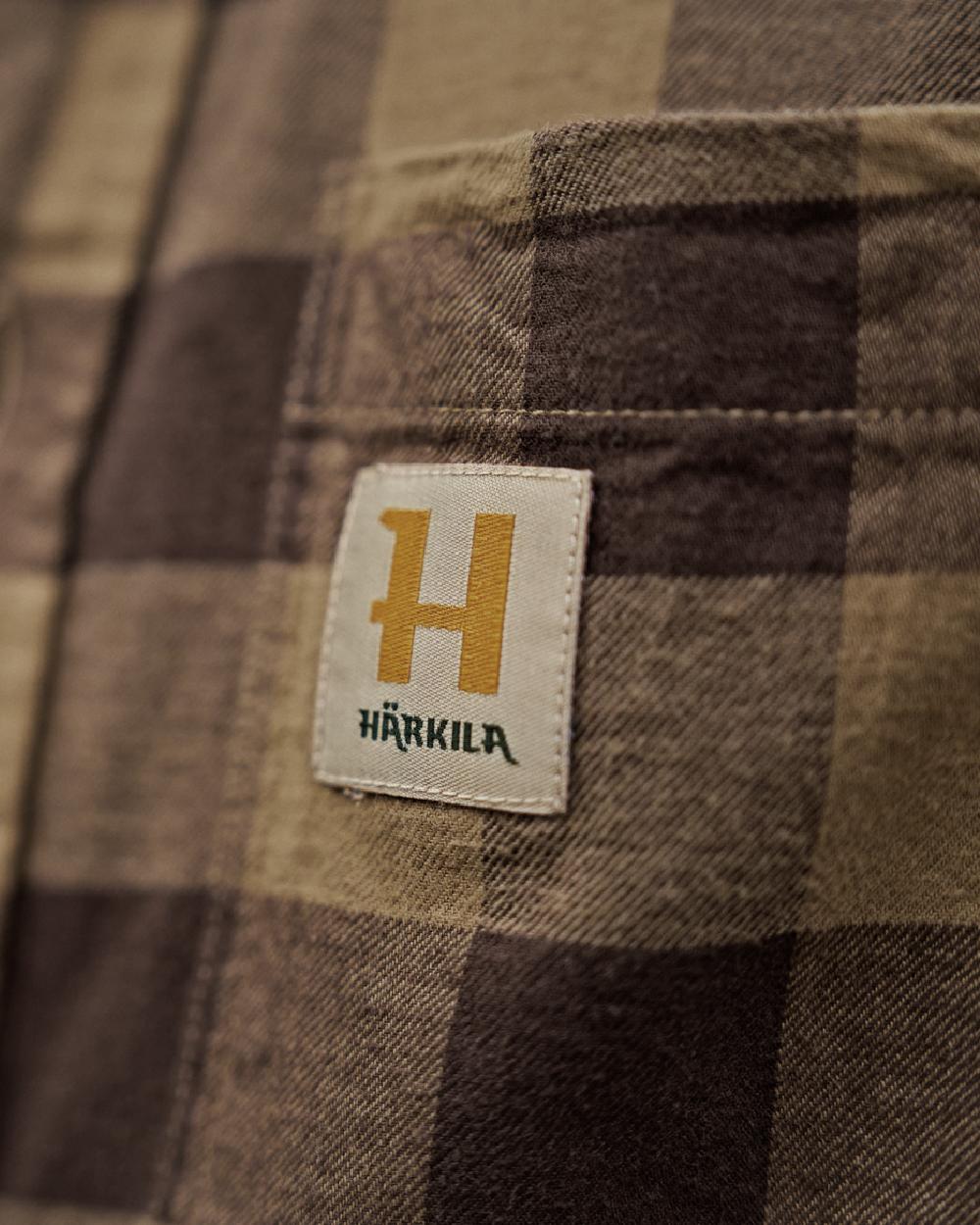 Antique Bronze Check Coloured Harkila Scandinavian Long Sleeve Shirt on blurry background