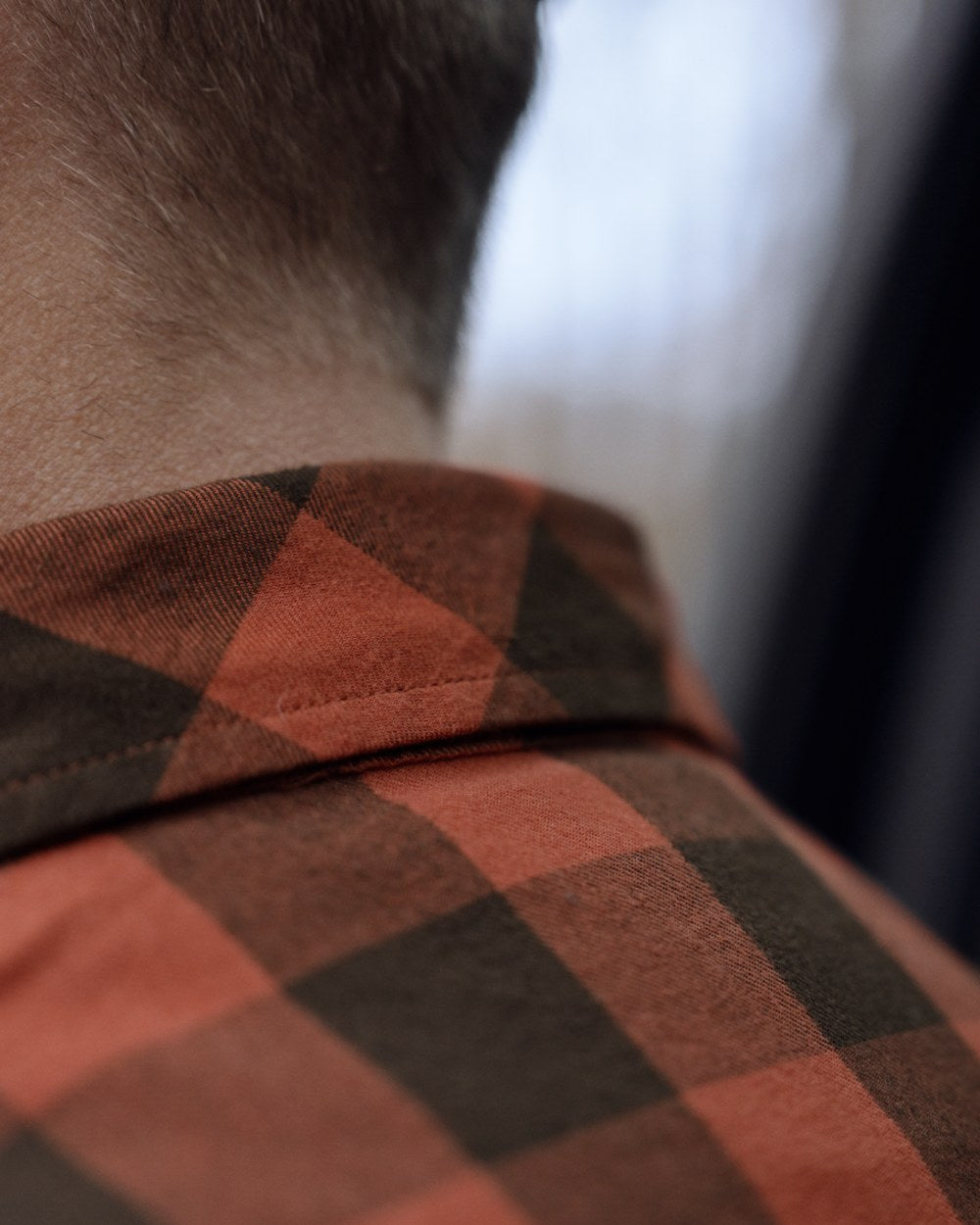 Autumn Orange Check coloured Harkila Scandinavian Long Sleeve Shirt on outdoor background