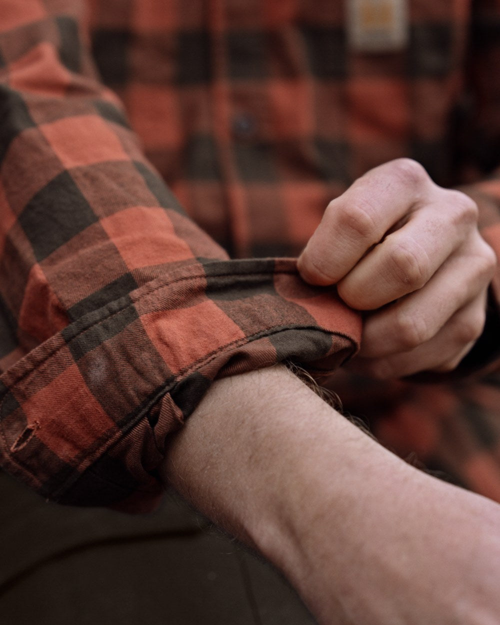 Autumn Orange Check coloured Harkila Scandinavian Long Sleeve Shirt on outdoor background