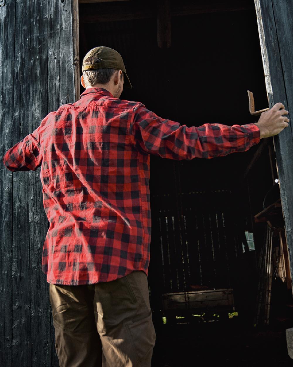 Red Check Coloured Harkila Scandinavian Long Sleeve Shirt on outdoor background