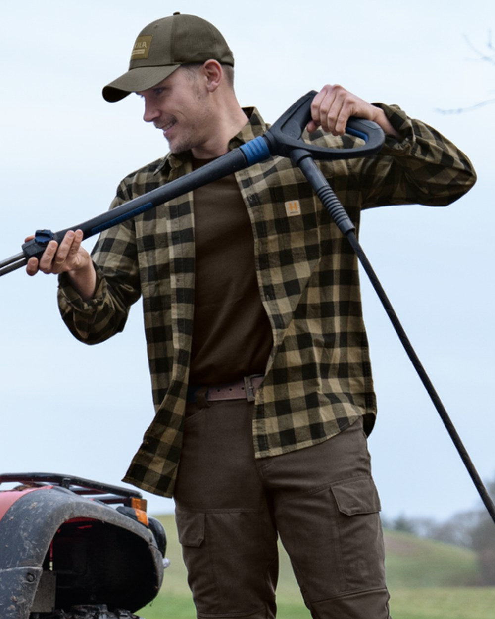 Tarmac Check coloured Harkila Scandinavian Long Sleeve Shirt on outdoor background