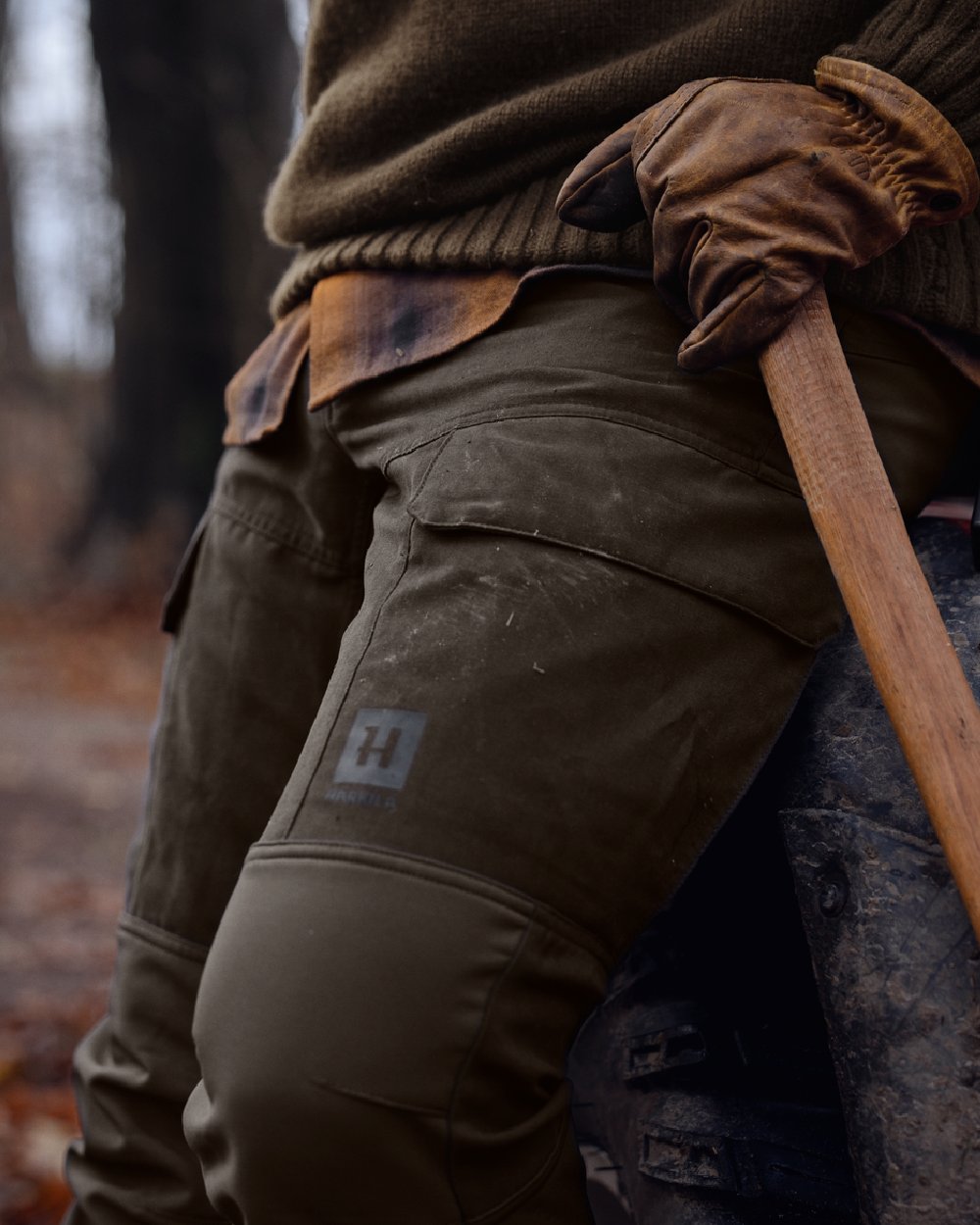 Shadow Brown Deep Brown coloured Harkila Scandinavian Trousers on woodland background