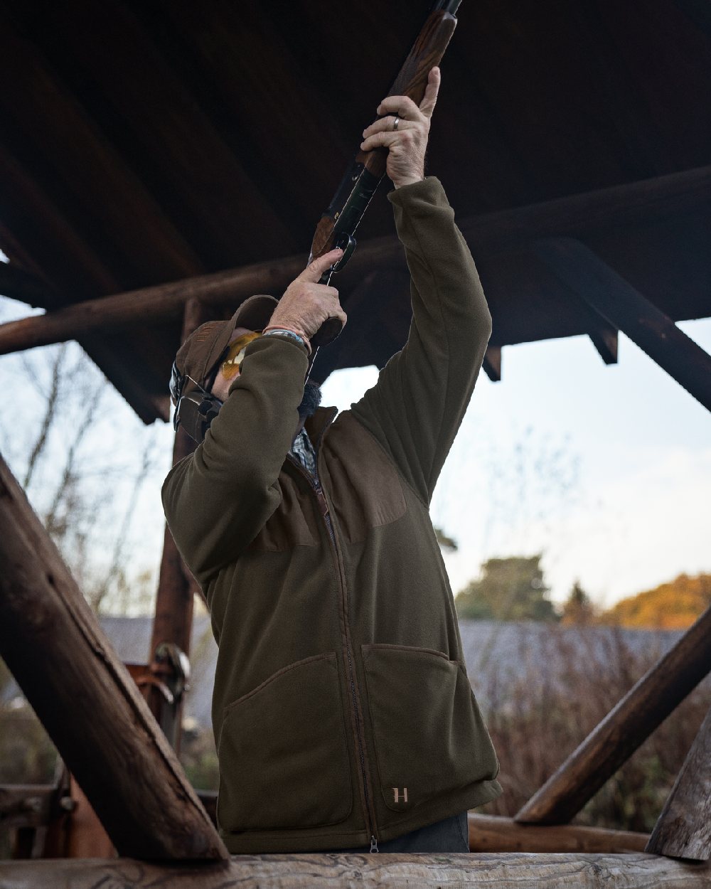 Willow Green Coloured Harkila Stornoway Active Shooting HSP Jacket on outdoor background