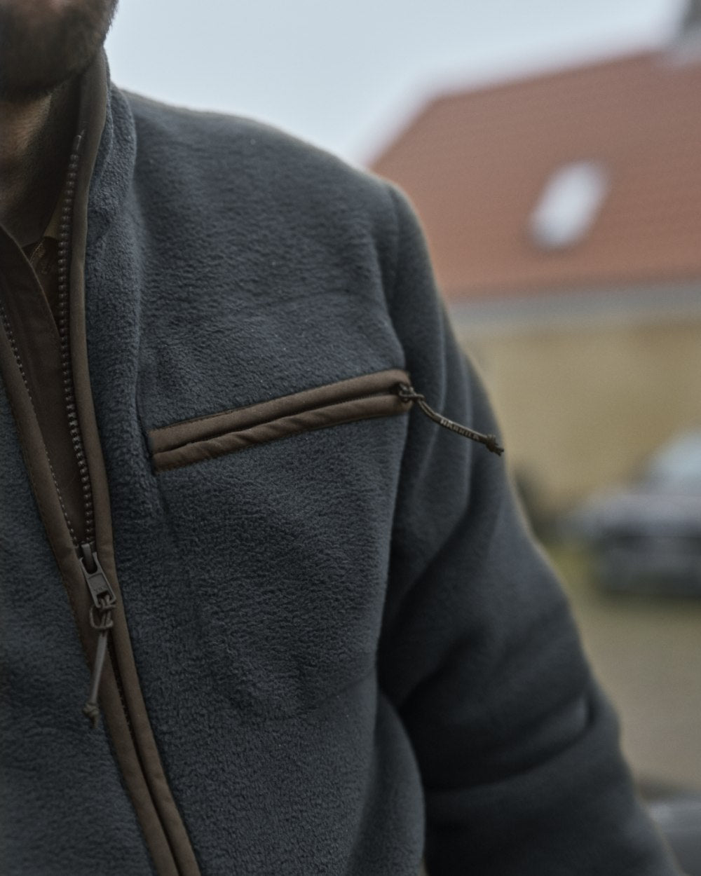 Dark Navy Coloured Harkila Torsby Fleece Jacket on outdoor background