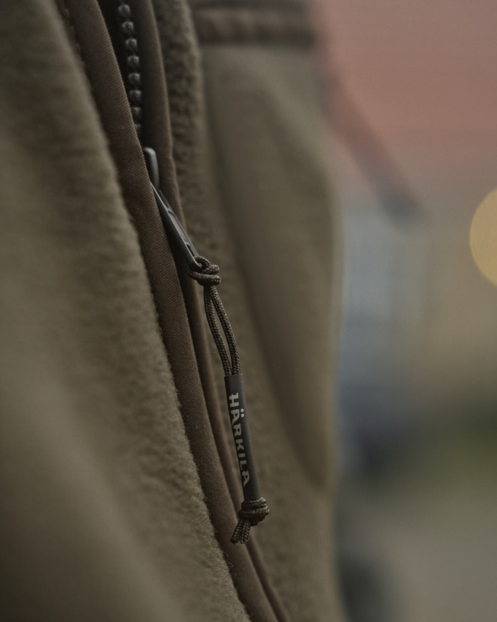 Willow Green Coloured Harkila Torsby Fleece Jacket on outdoor background