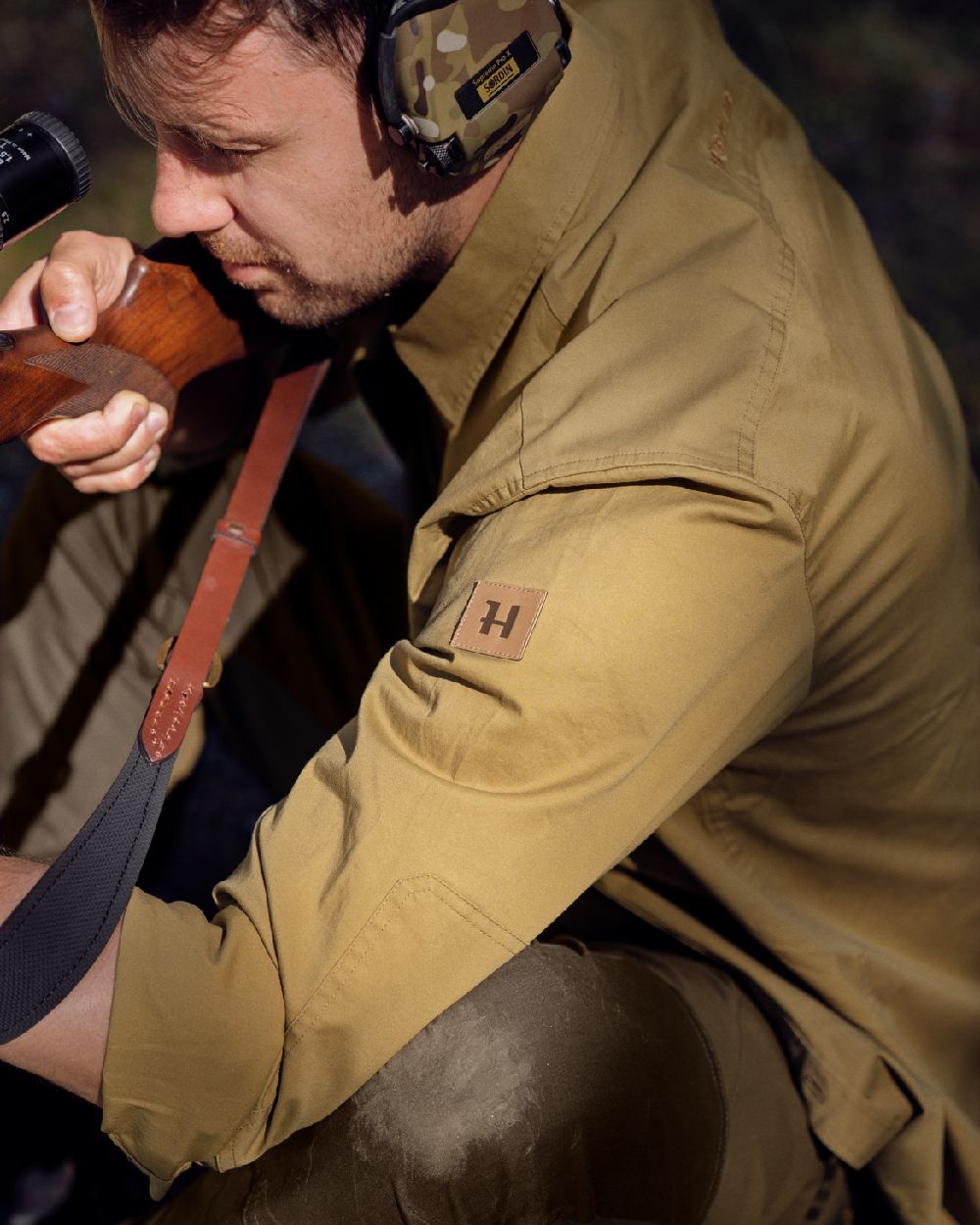 Antique Sand Coloured Harkila Trym Skjorte on blurry background