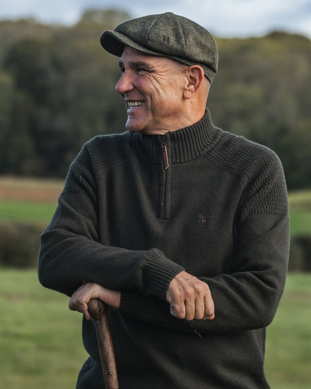 Rosin Coloured Harkila Vincent Merino Half Zip Pullover on forest background