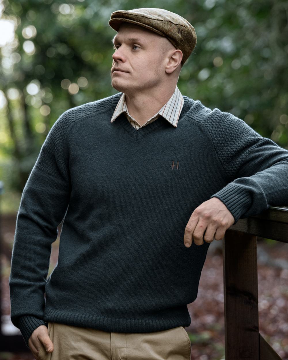 Dark Navy Coloured Harkila Vincent Merino V-Neck Pullover on forest background