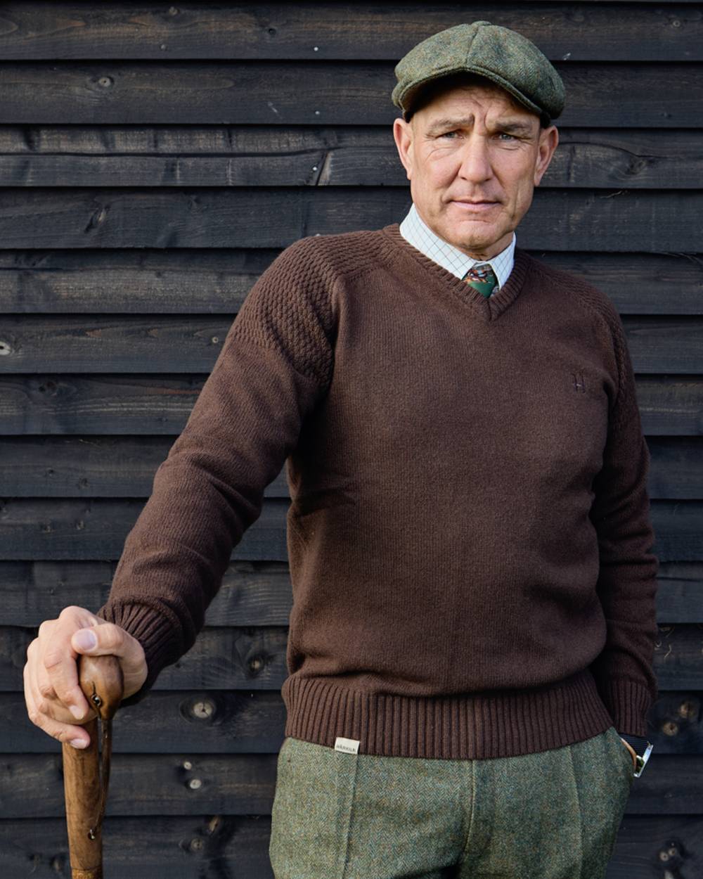 Demitasse Brown Coloured Harkila Vincent Merino V-Neck Pullover on outdoor background