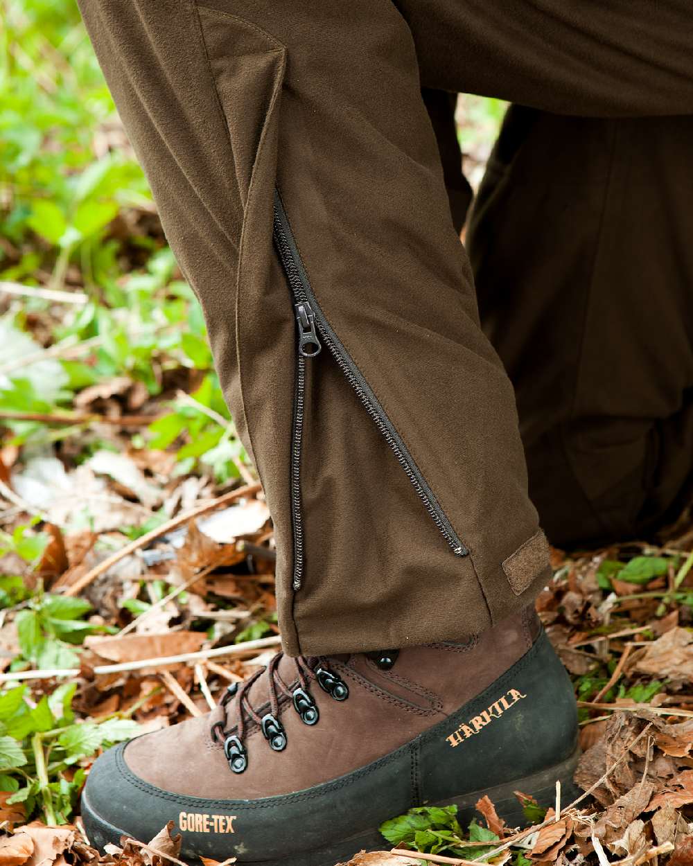 Hunting Green Coloured Harkila Visent Trousers on outdoor background