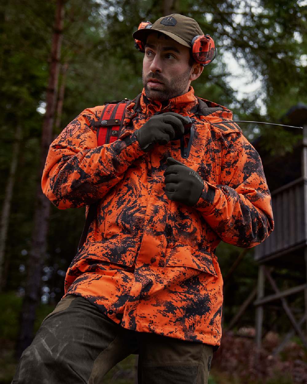 AXIS Orange Blaze Coloured Harkila Wildboar Pro HWS Insulated Jacket on outdoor background