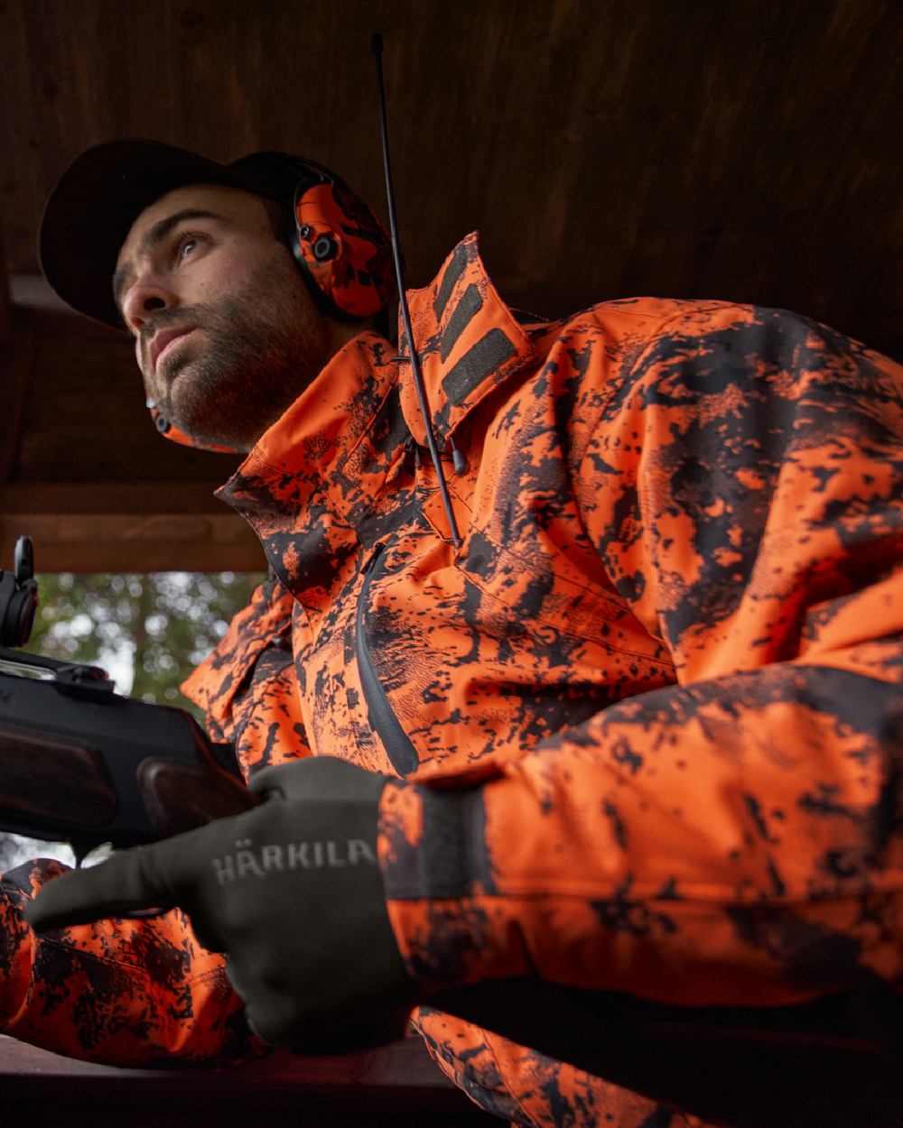 AXIS Orange Blaze Coloured Harkila Wildboar Pro HWS Insulated Jacket on outdoor background