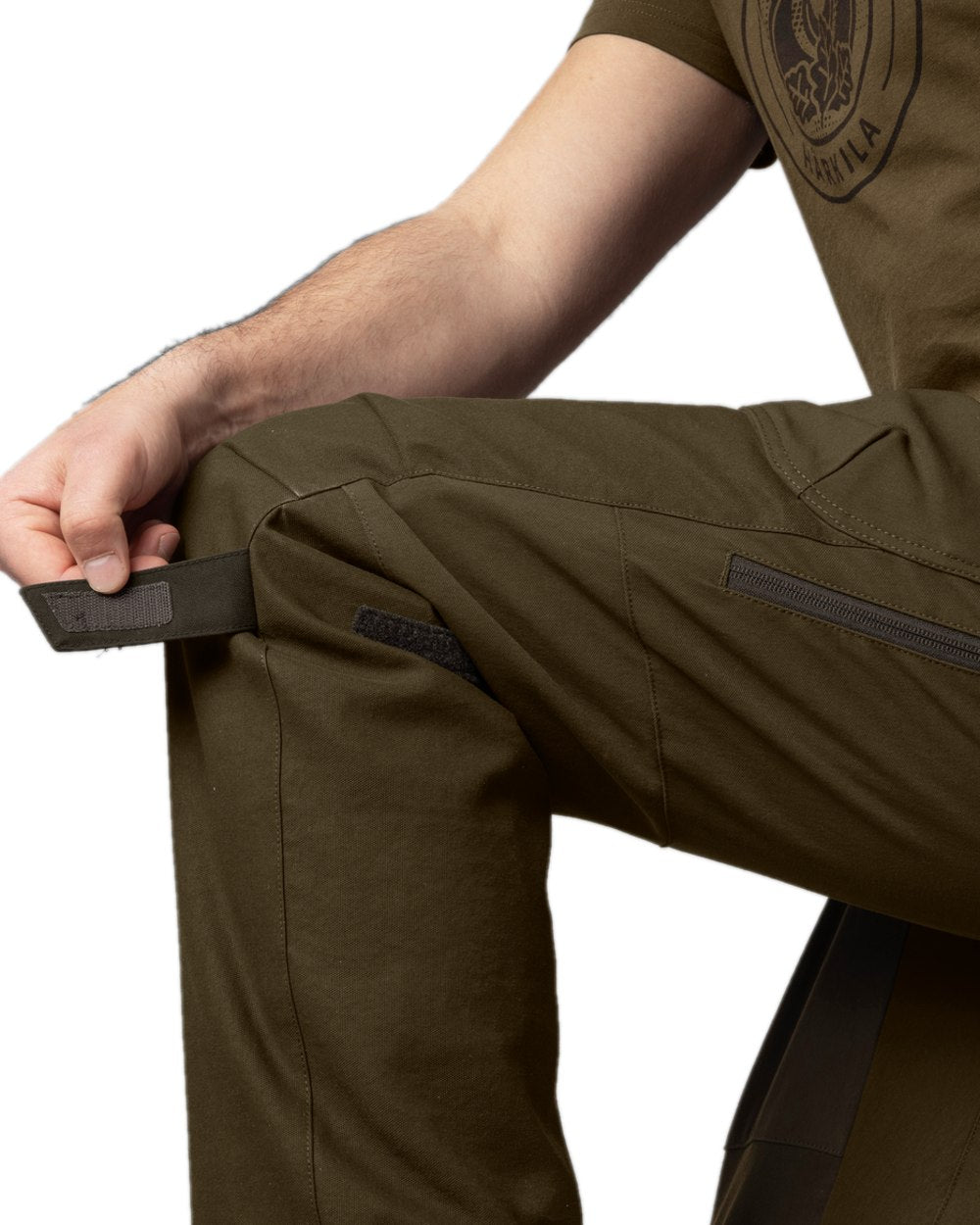 Willow Green Coloured Harkila Wildboar Pro Move Trousers on white background