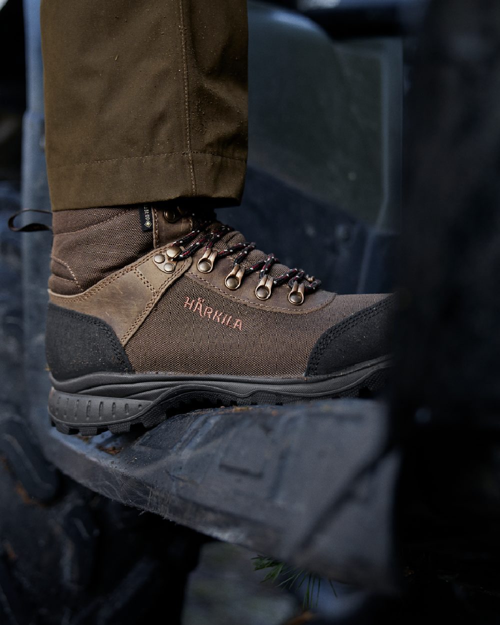 Mid Brown Coloured Harkila Wildwood 2.0 GTX Womens Waterproof Boots on outdoor background